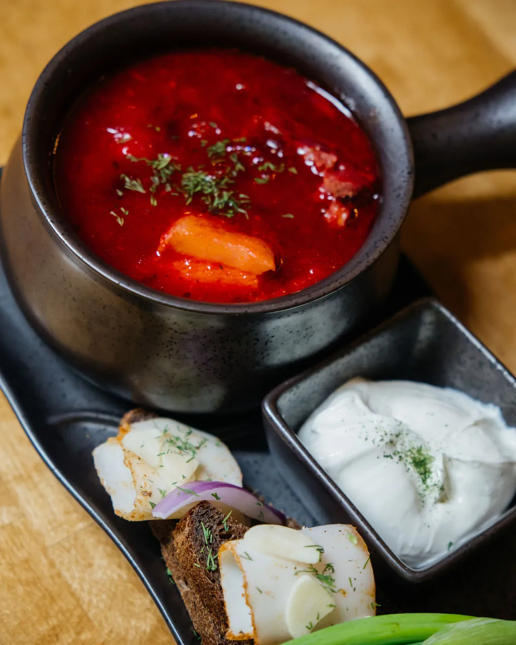 Borscht with sour cream and dark bread at VERES