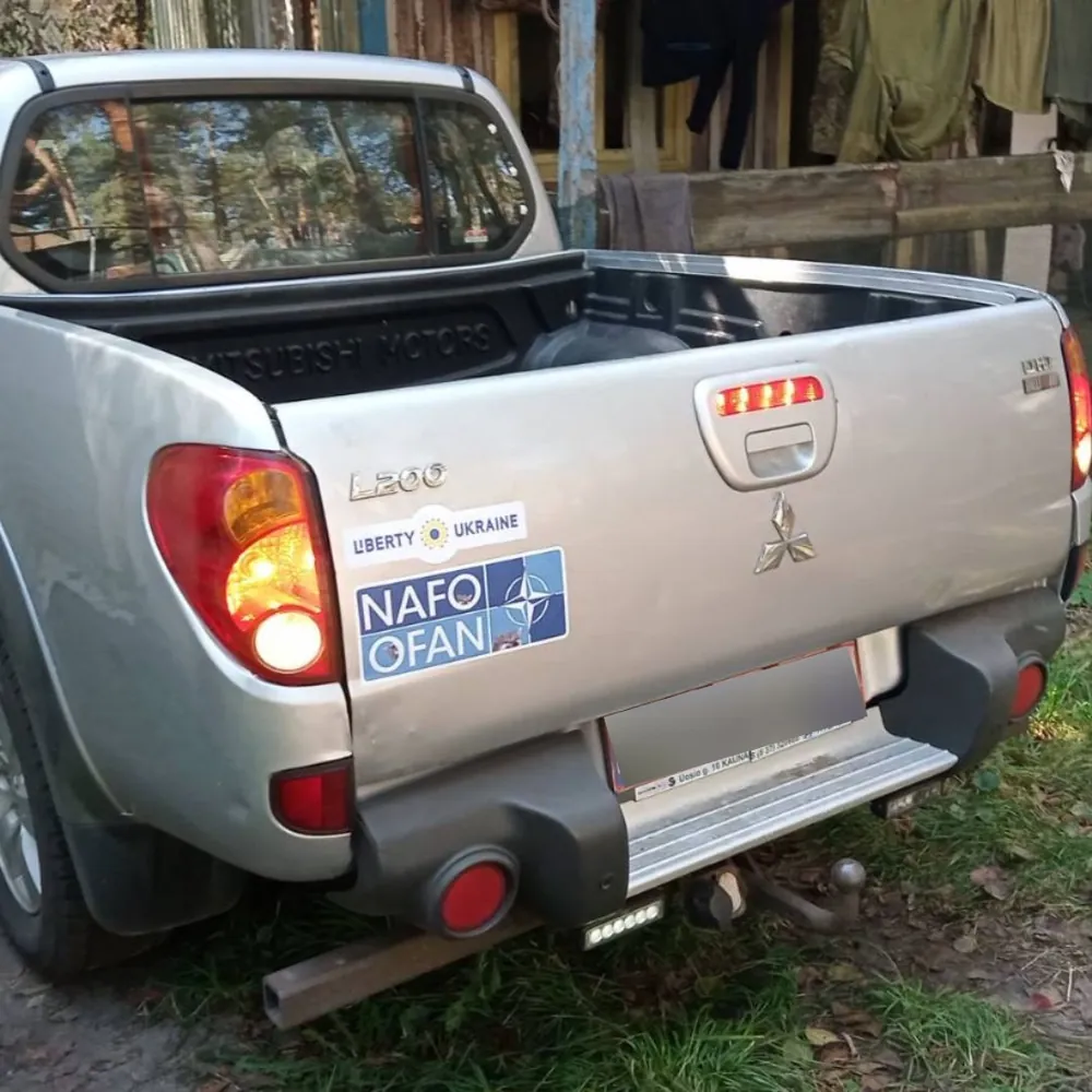 A delivered pickup with Liberty Ukraine and NAFO stickers